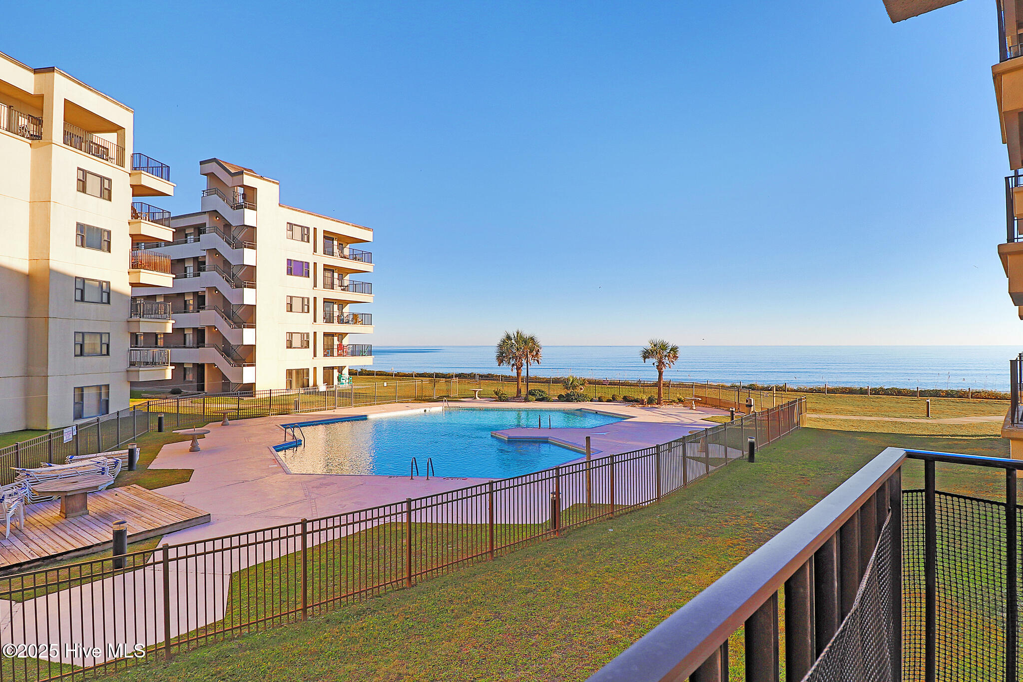 1505 Salter Path Road, Unit 235 SUMMER WINDS Indian Beach, NC 28512 - Photo 2 of 46 Ocean & pool views from covered porch