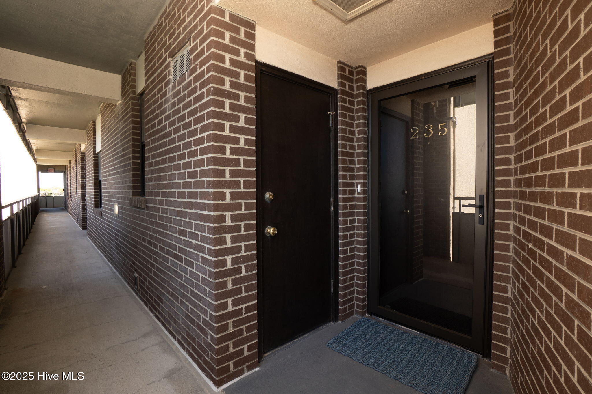 1505 Salter Path Road, Unit 235 SUMMER WINDS Indian Beach, NC 28512 - Photo 25 of 46 Covered entrance to condo 235