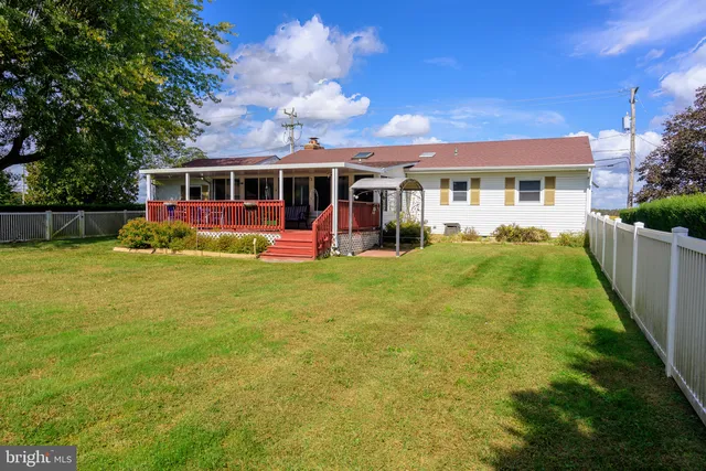 a view of a house with a big yard