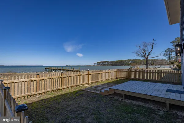 a view of a yard with wooden floor and outdoor space