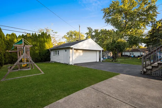 a view of a backyard with a patio