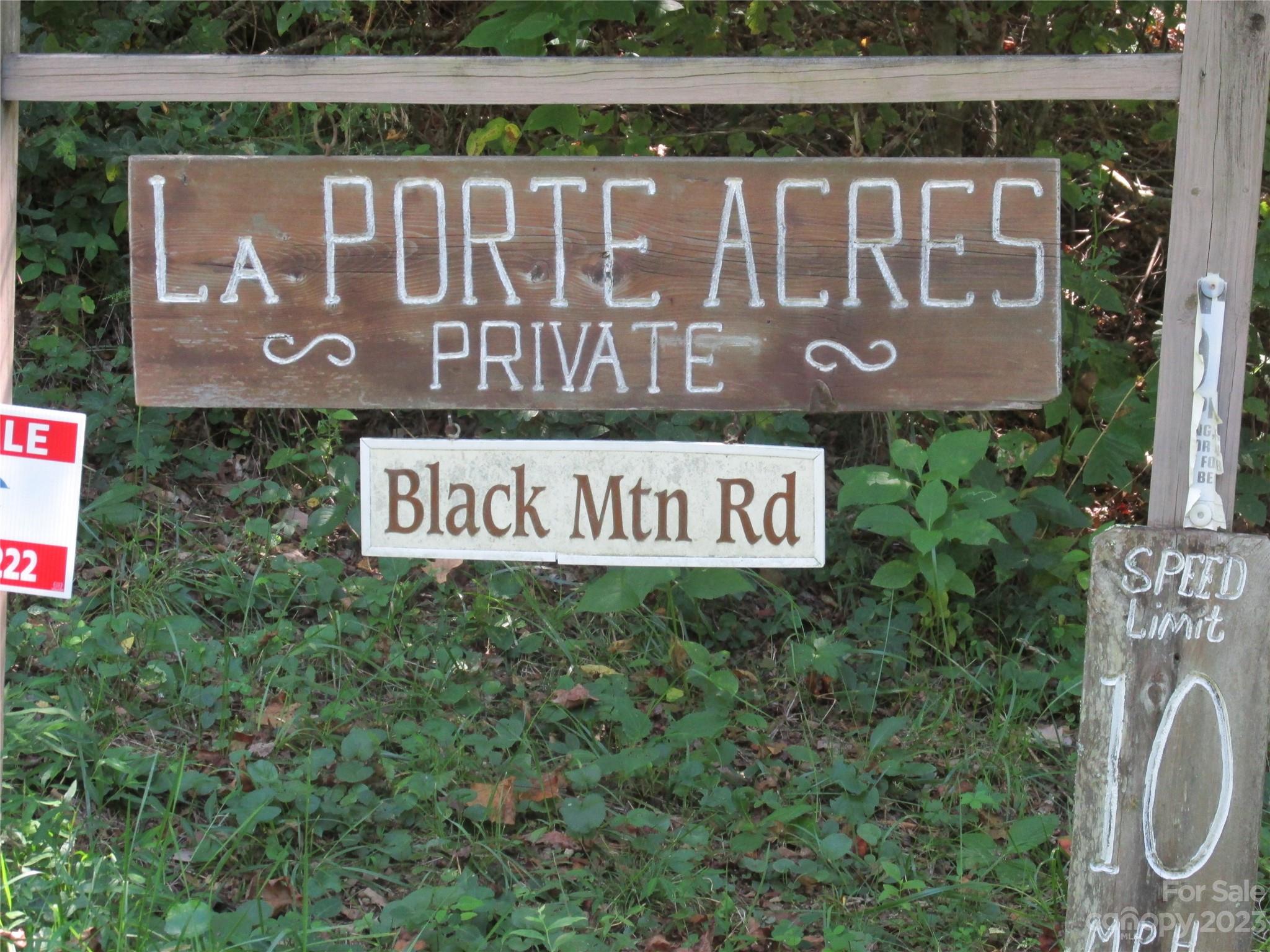 19 Tumbleweed Trail Cullowhee, NC 28723 - Photo 3 of 5 a sign that is on the side of a building