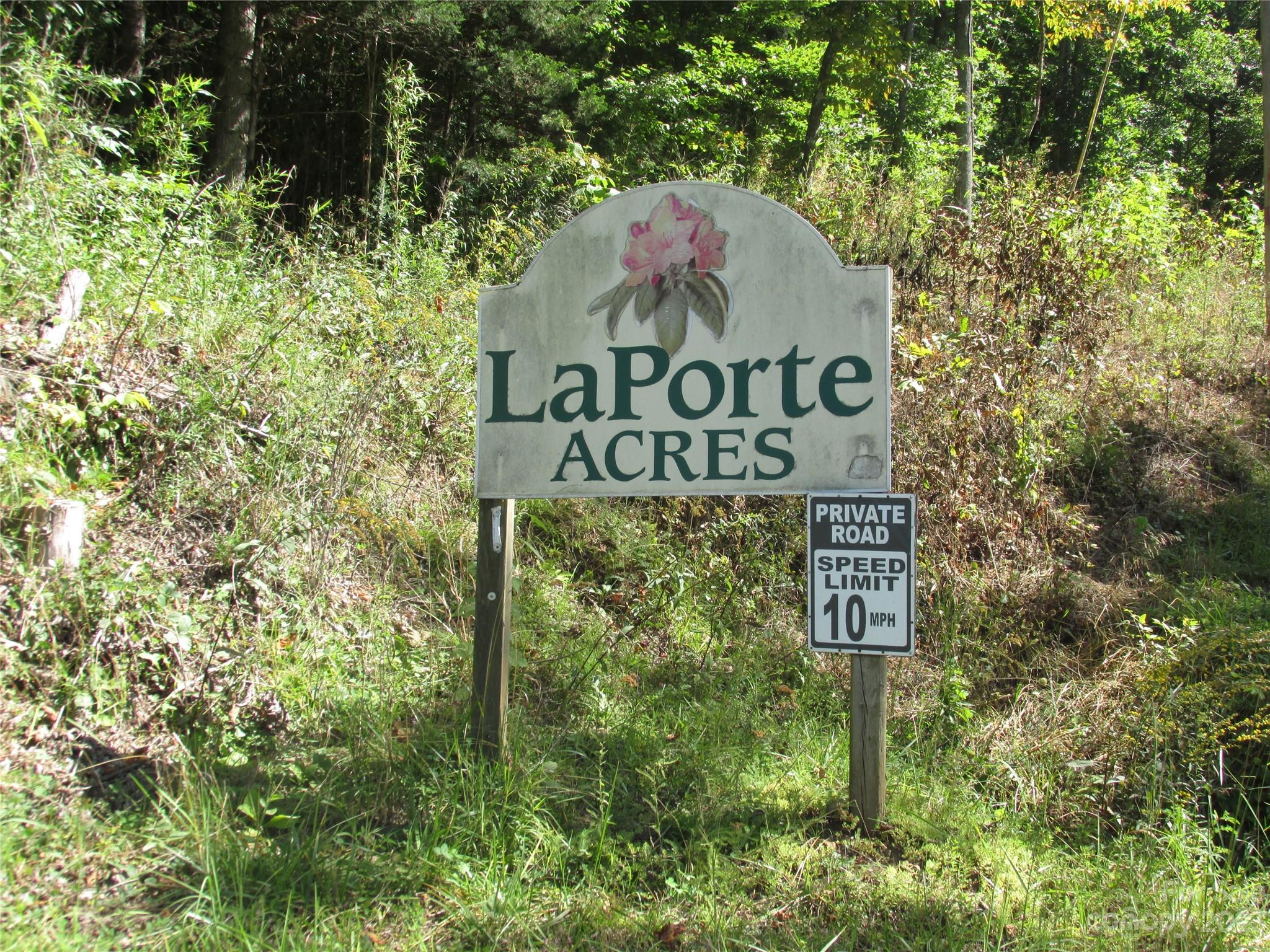 19 Tumbleweed Trail Cullowhee, NC 28723 - Photo 5 of 5 a sign broad on the side of the road