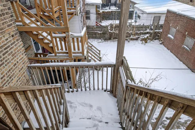 a view of balcony with furniture