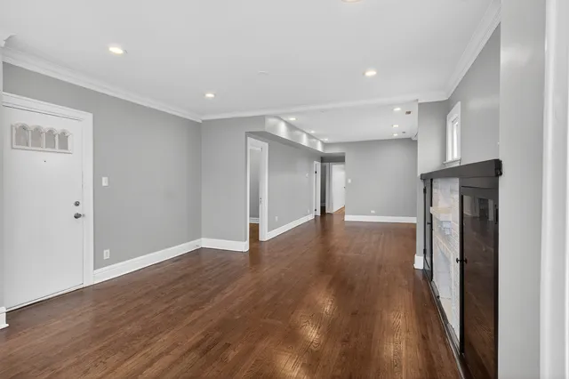 a view of a livingroom with wooden floor