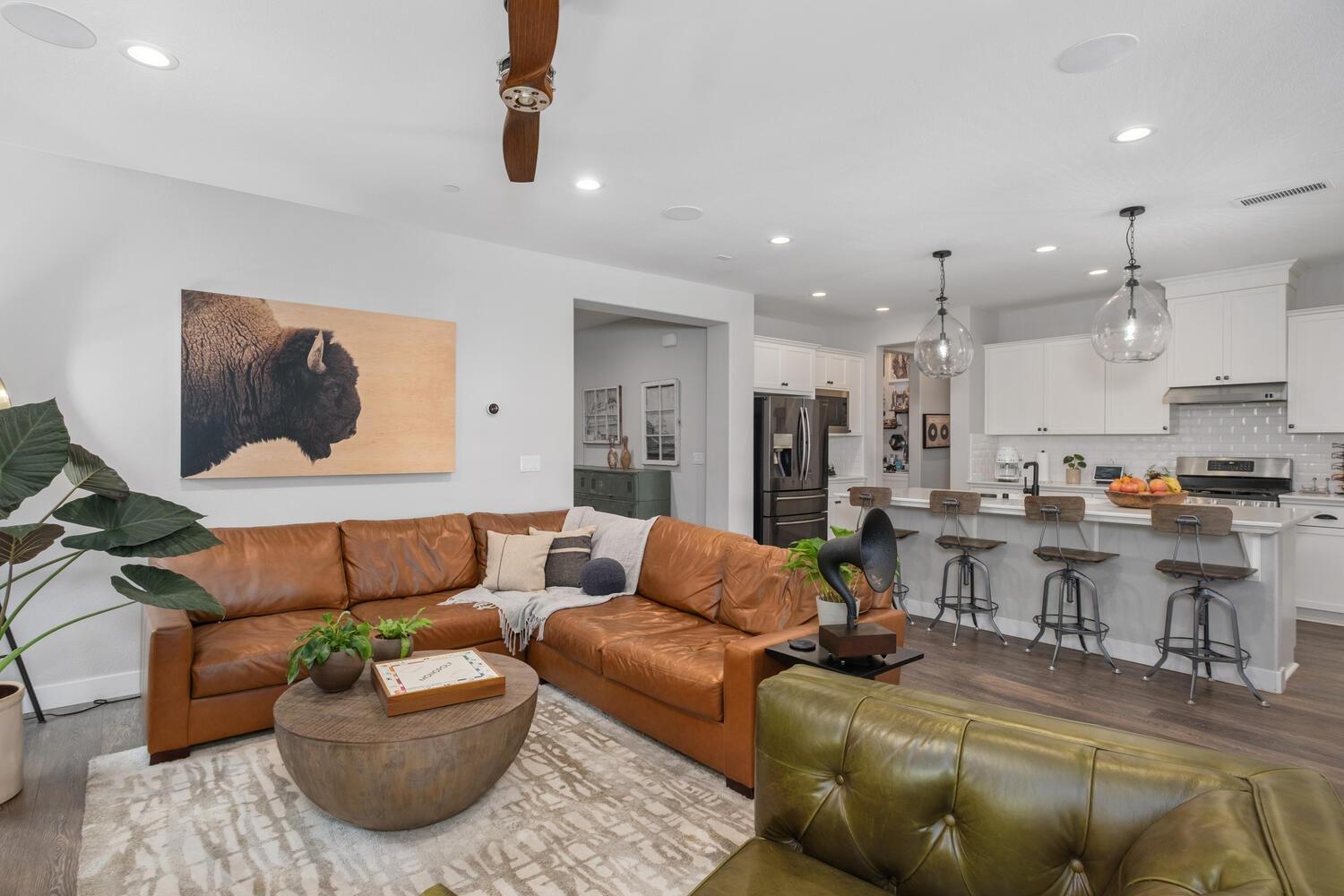 3477 Junipero Avenue Clovis, CA 93619 - Photo 11 of 39 a living room with furniture and a view of kitchen
