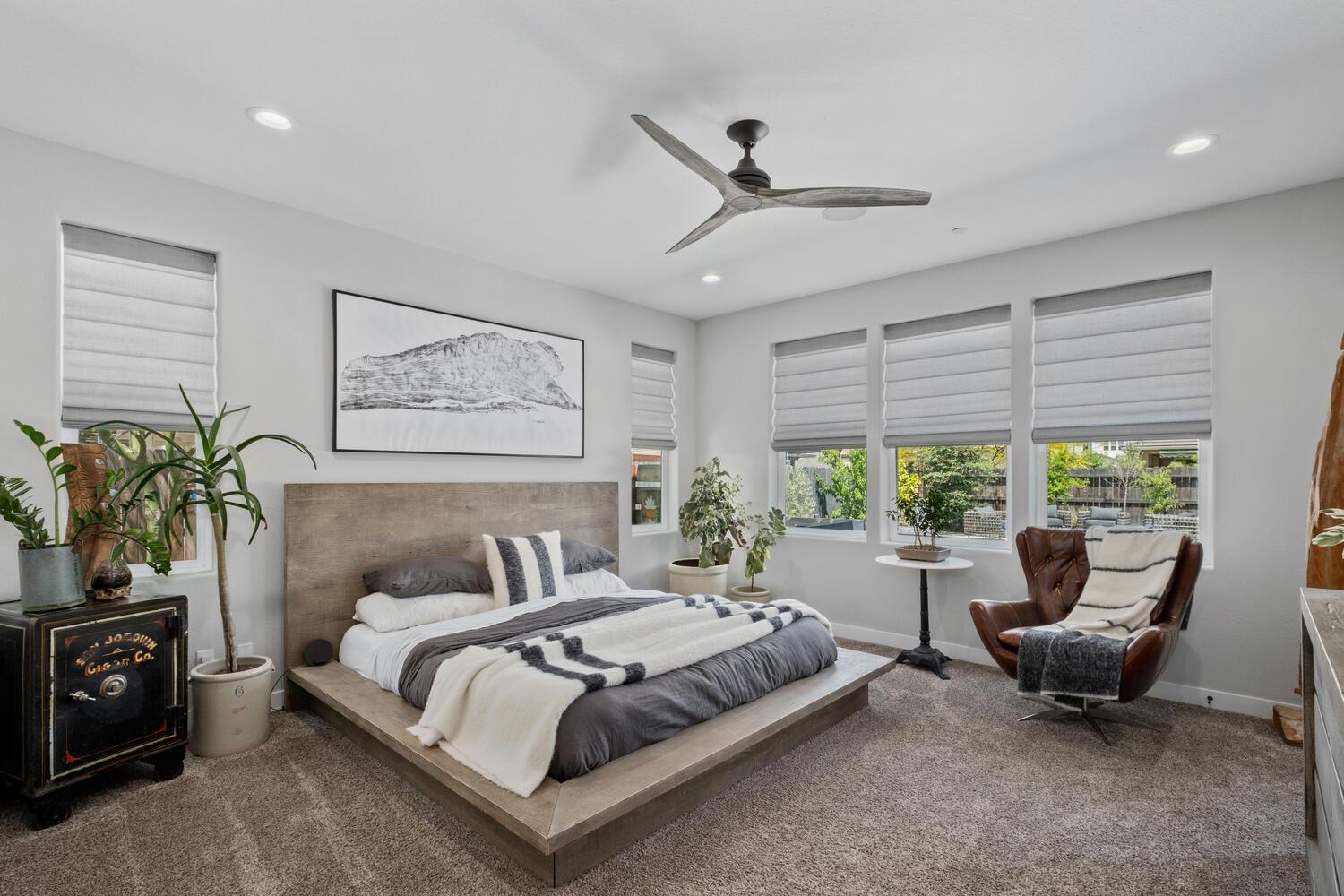 3477 Junipero Avenue Clovis, CA 93619 - Photo 18 of 39 a spacious bedroom with a bed and a large window