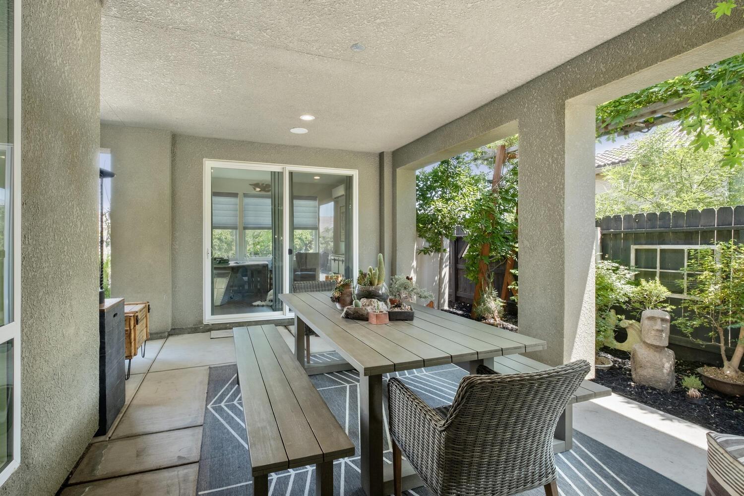 3477 Junipero Avenue Clovis, CA 93619 - Photo 25 of 39 a view of a dining room with furniture window and outside view