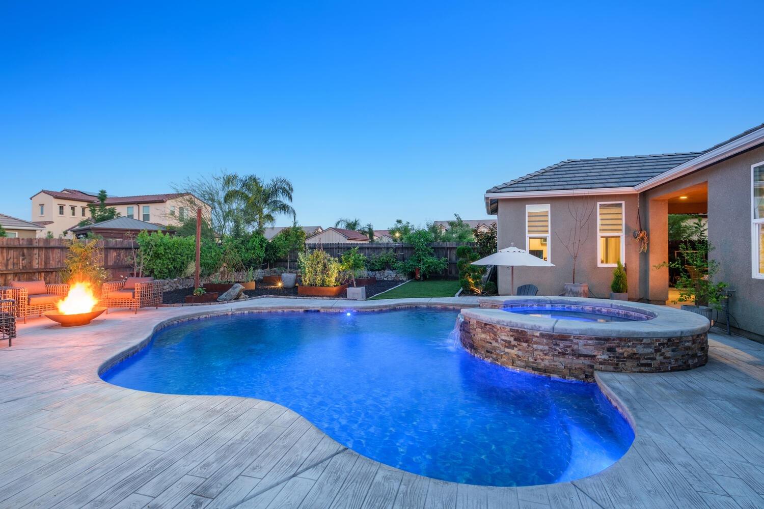 3477 Junipero Avenue Clovis, CA 93619 - Photo 35 of 39 a view of a house with swimming pool