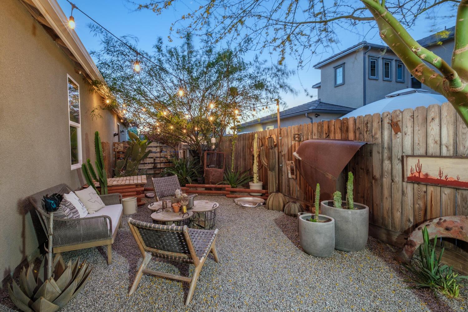 3477 Junipero Avenue Clovis, CA 93619 - Photo 5 of 39 a view of a patio with couches and potted plants