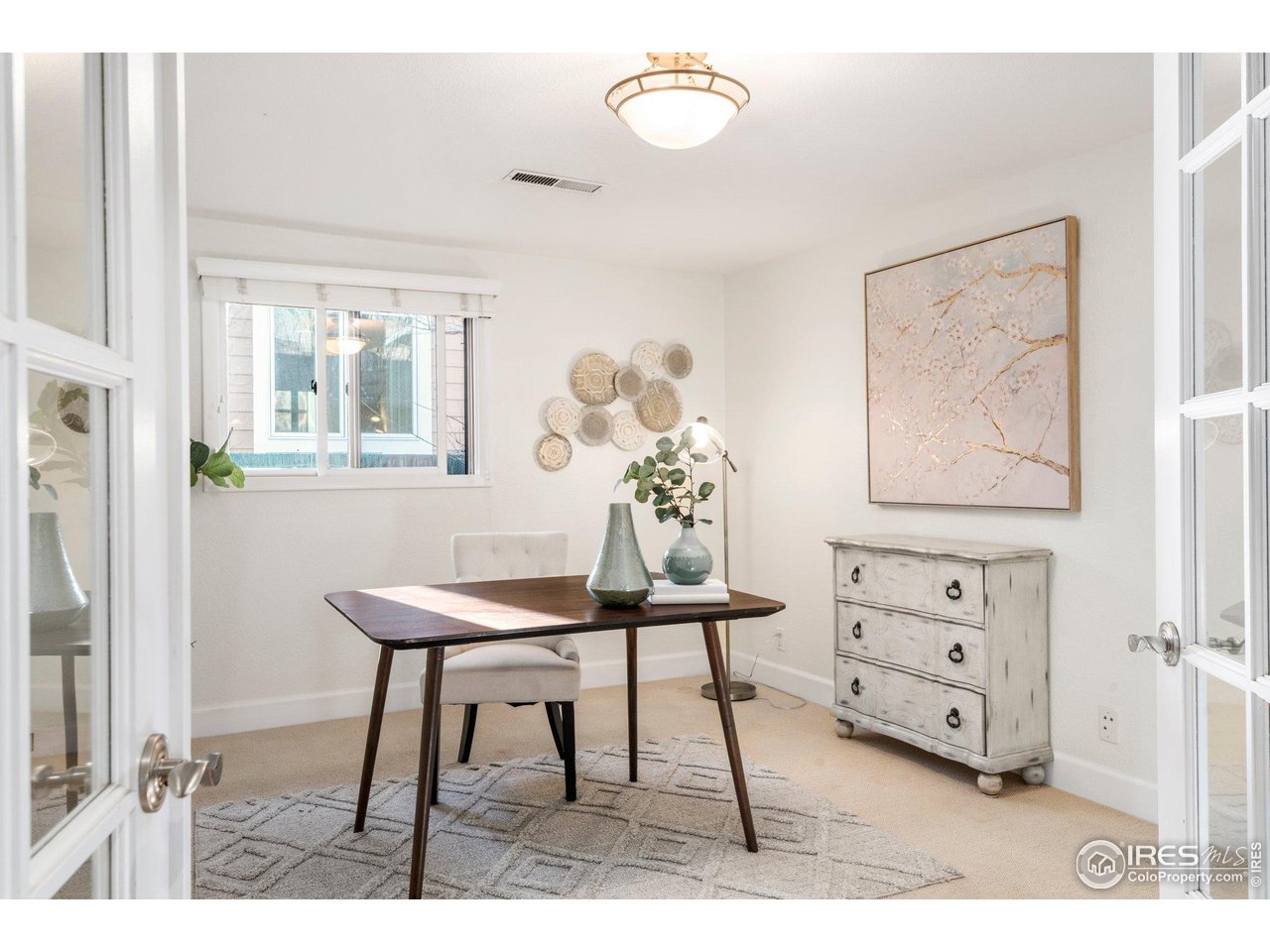 1490 Periwinkle Drive Boulder, CO 80304 - Photo 12 of 25 a living room with furniture and a window