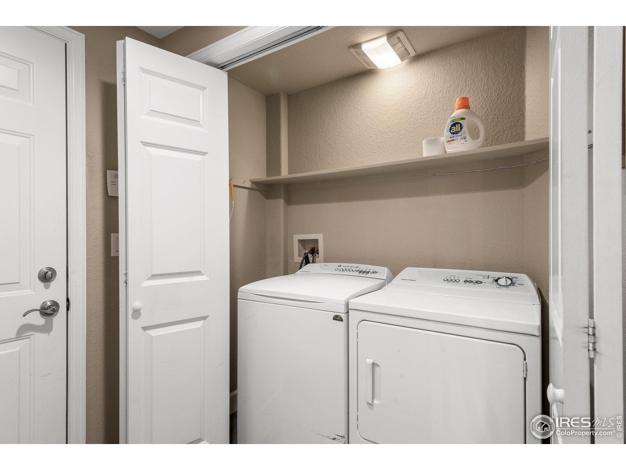 1490 Periwinkle Drive Boulder, CO 80304 - Photo 21 of 25 a utility room with dryer and washer