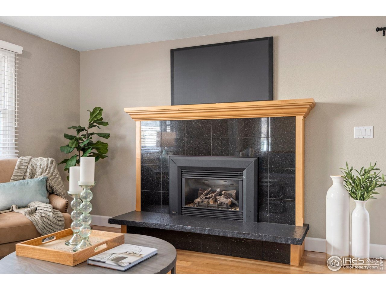 1490 Periwinkle Drive Boulder, CO 80304 - Photo 6 of 25 a living room with furniture and a fireplace