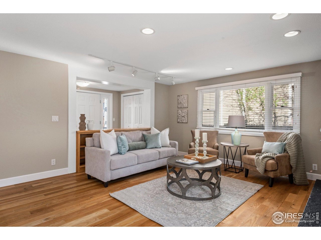 1490 Periwinkle Drive Boulder, CO 80304 - Photo 7 of 25 a living room with furniture and a large window