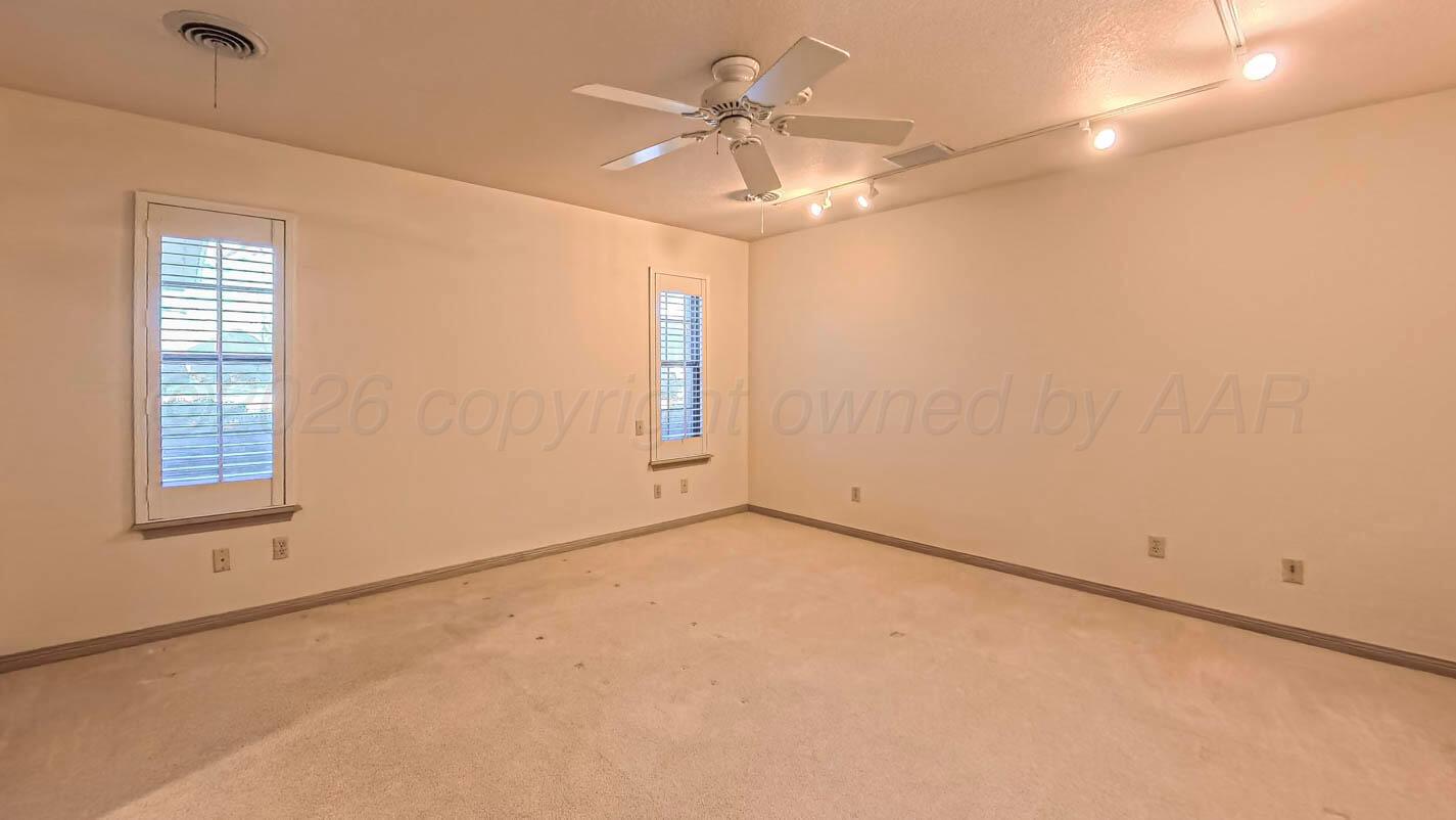 4311 Arp Place Amarillo, TX 79109 - Photo 17 of 36 a view of an empty room with a window