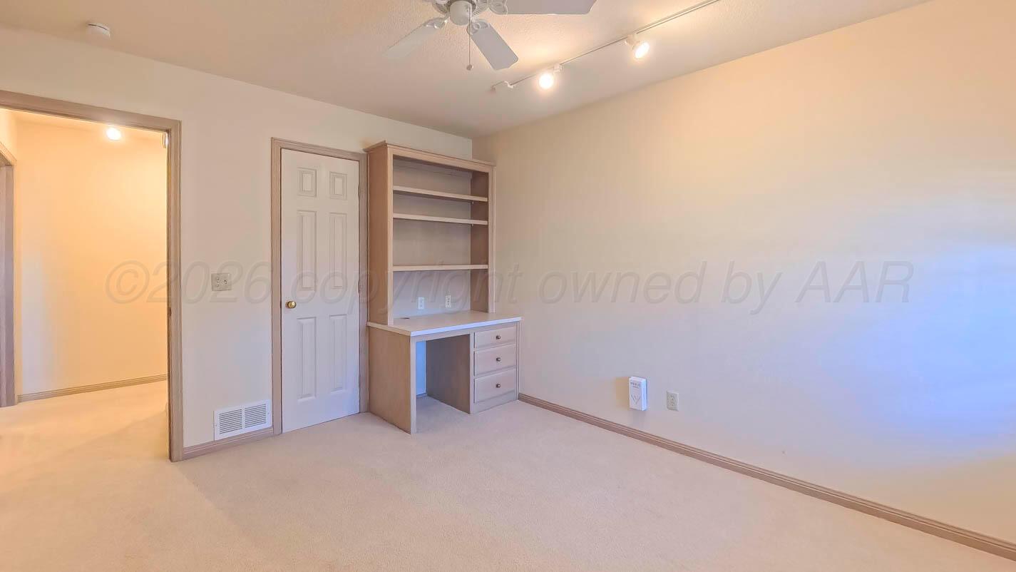 4311 Arp Place Amarillo, TX 79109 - Photo 23 of 36 a view of an empty room with closet and a window