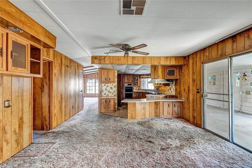 1348 Jasmine Way Hemet, CA 92545 - Photo 18 of 33 a view of a kitchen with refrigerator cabinets