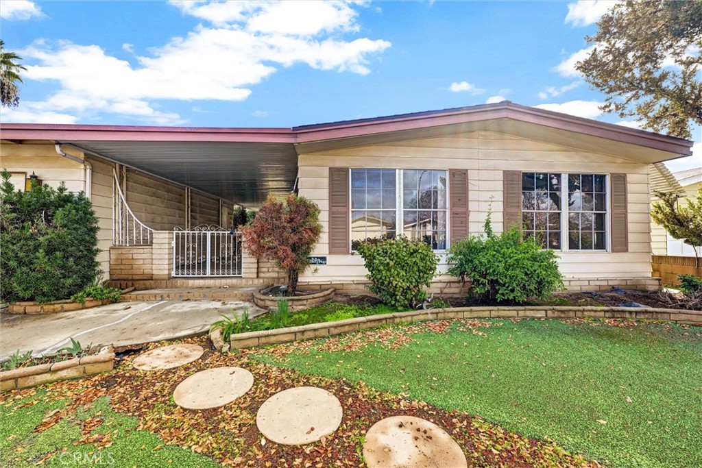 1348 Jasmine Way Hemet, CA 92545 - Photo 2 of 33 a view of a house with backyard and porch