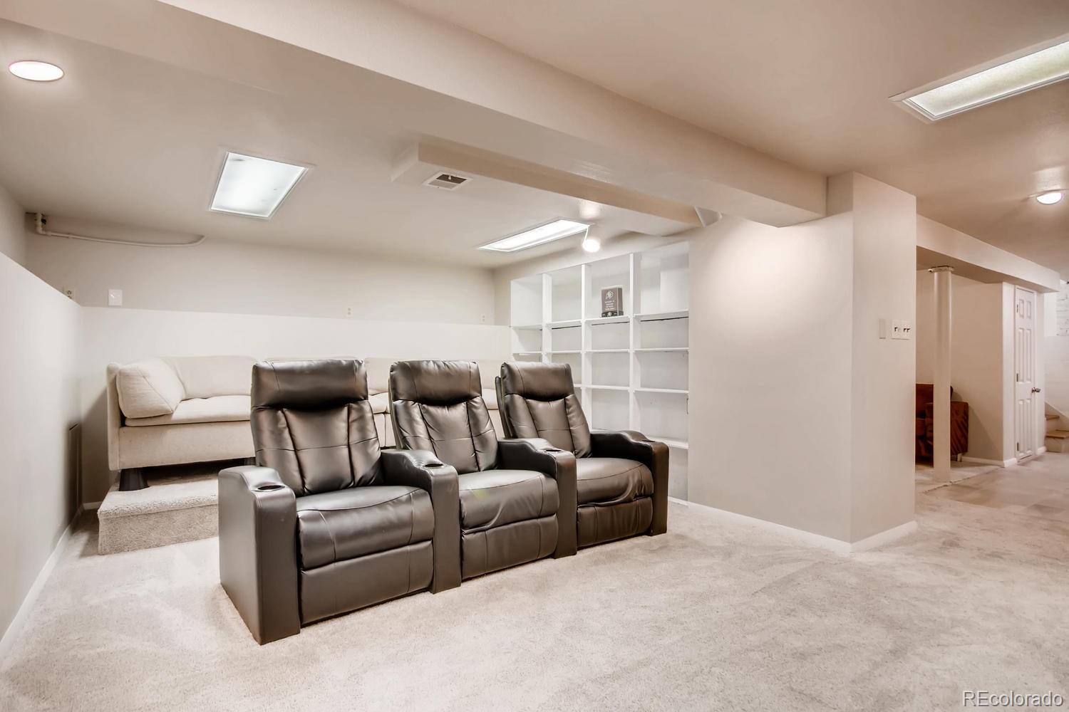 777 South Sherman Street Denver, CO 80209 - Photo 21 of 35 a living room with furniture and a walk in closet