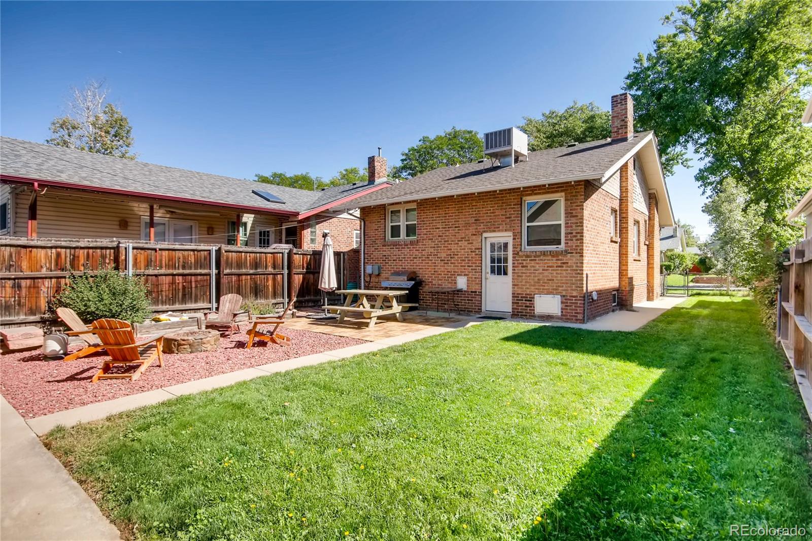777 South Sherman Street Denver, CO 80209 - Photo 31 of 35 a view of a backyard with sitting area and furniture