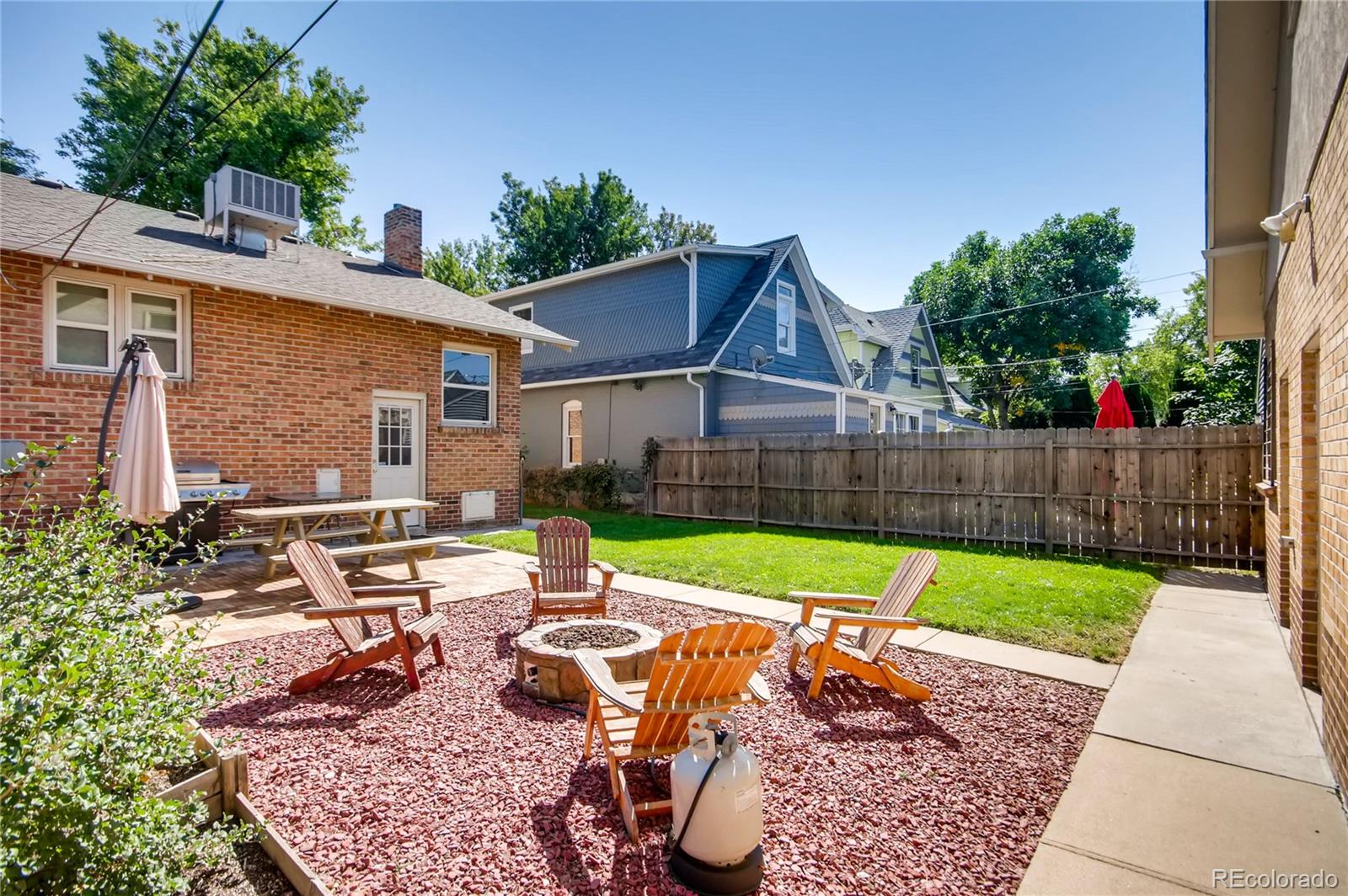 777 South Sherman Street Denver, CO 80209 - Photo 33 of 35 a view of backyard with outdoor seating and green space