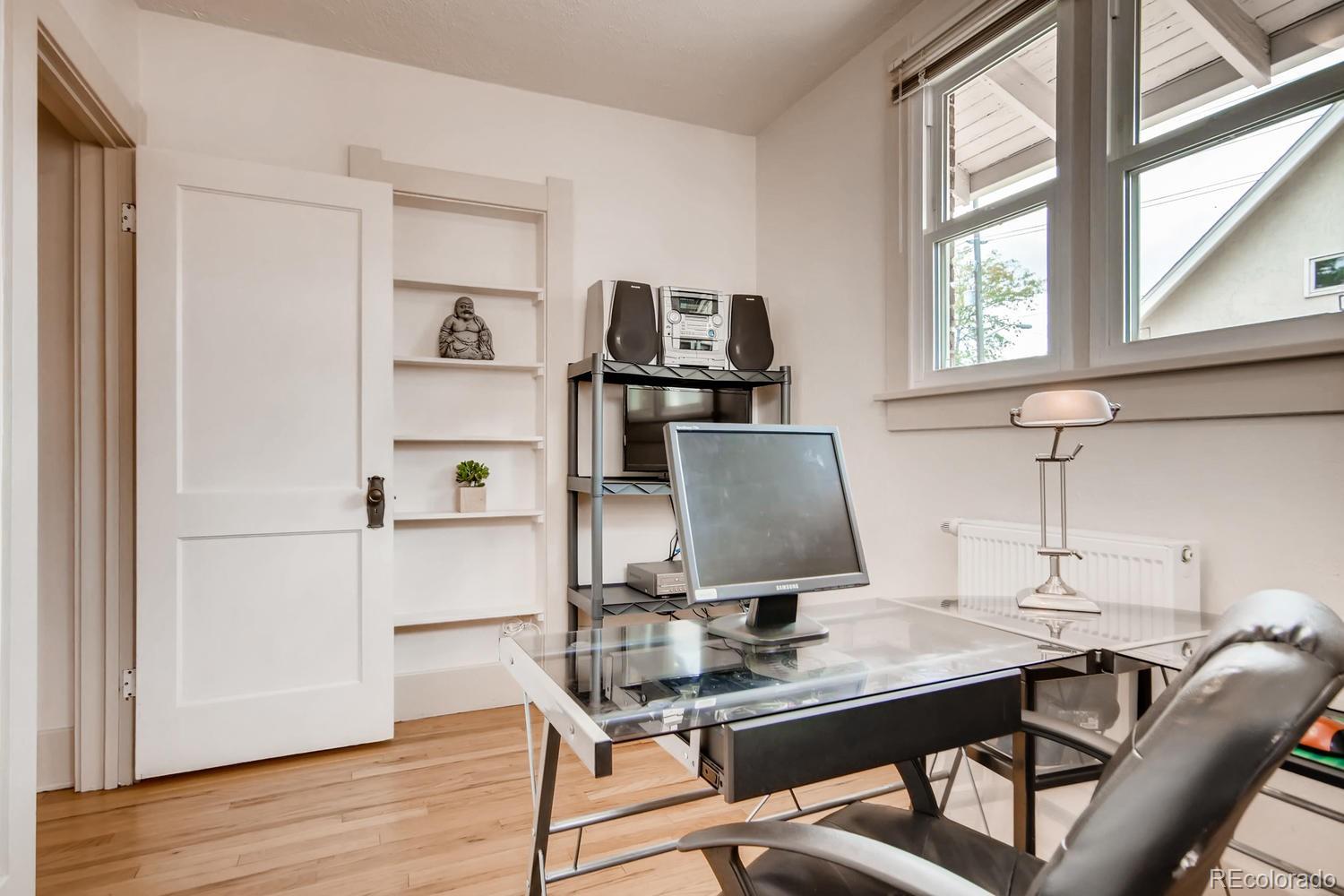 777 South Sherman Street Denver, CO 80209 - Photo 10 of 35 a view of a workspace with furniture and window
