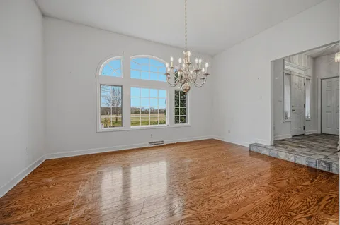 a view of an empty room and window