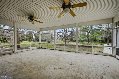 an empty room with sliding door