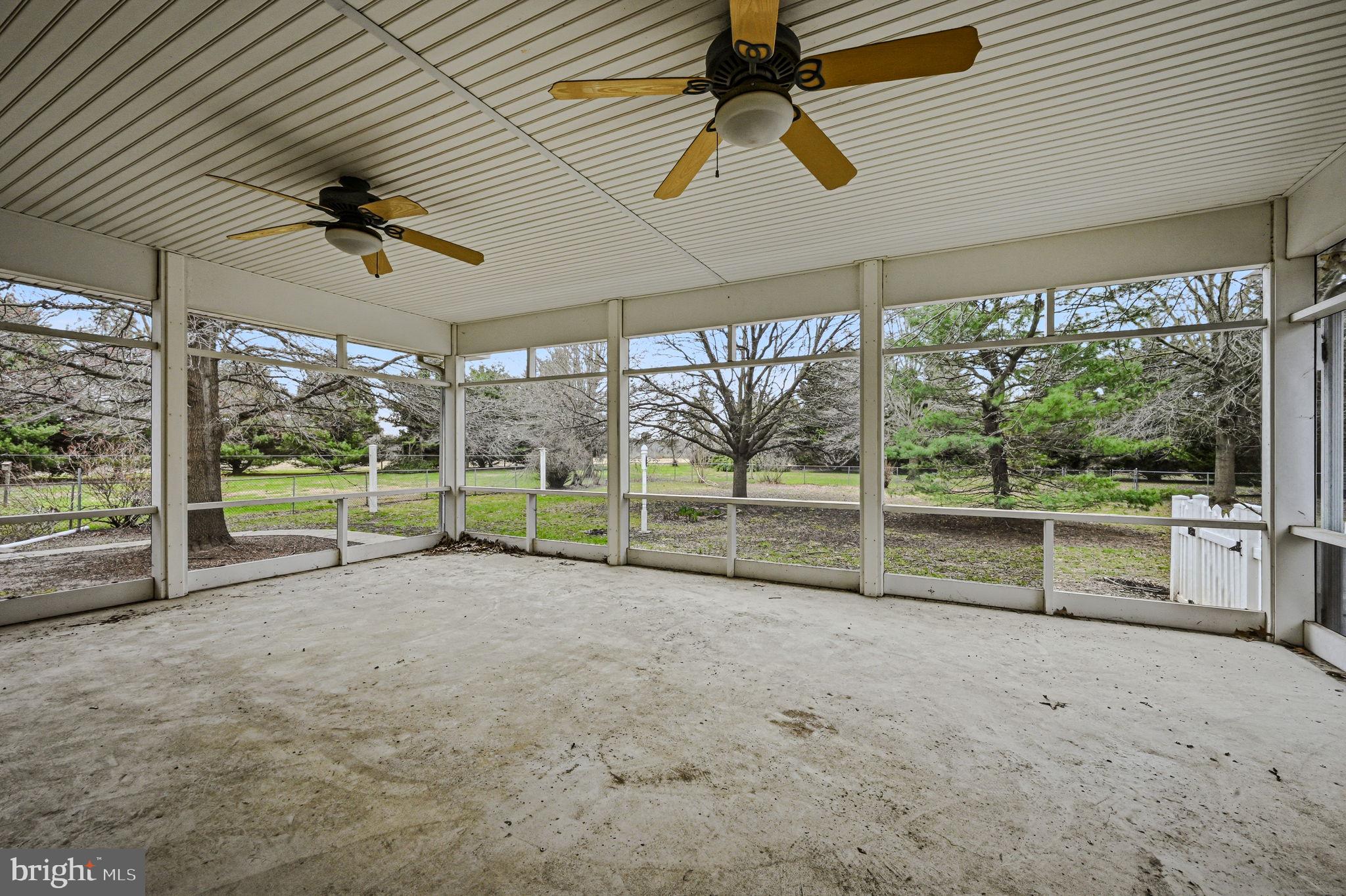 812 Taylors Bridge Road Townsend, DE 19734 - Photo 34 of 45 an empty room with sliding door