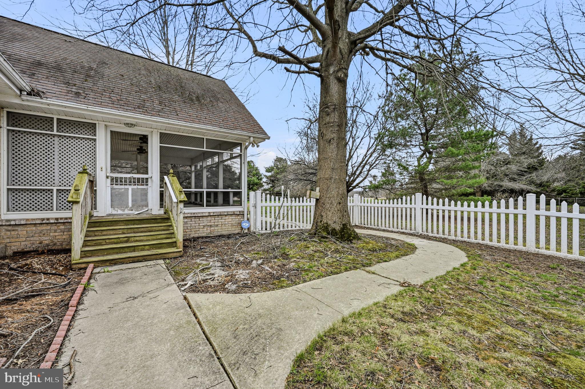 812 Taylors Bridge Road Townsend, DE 19734 - Photo 36 of 45 a front view of a house with garden