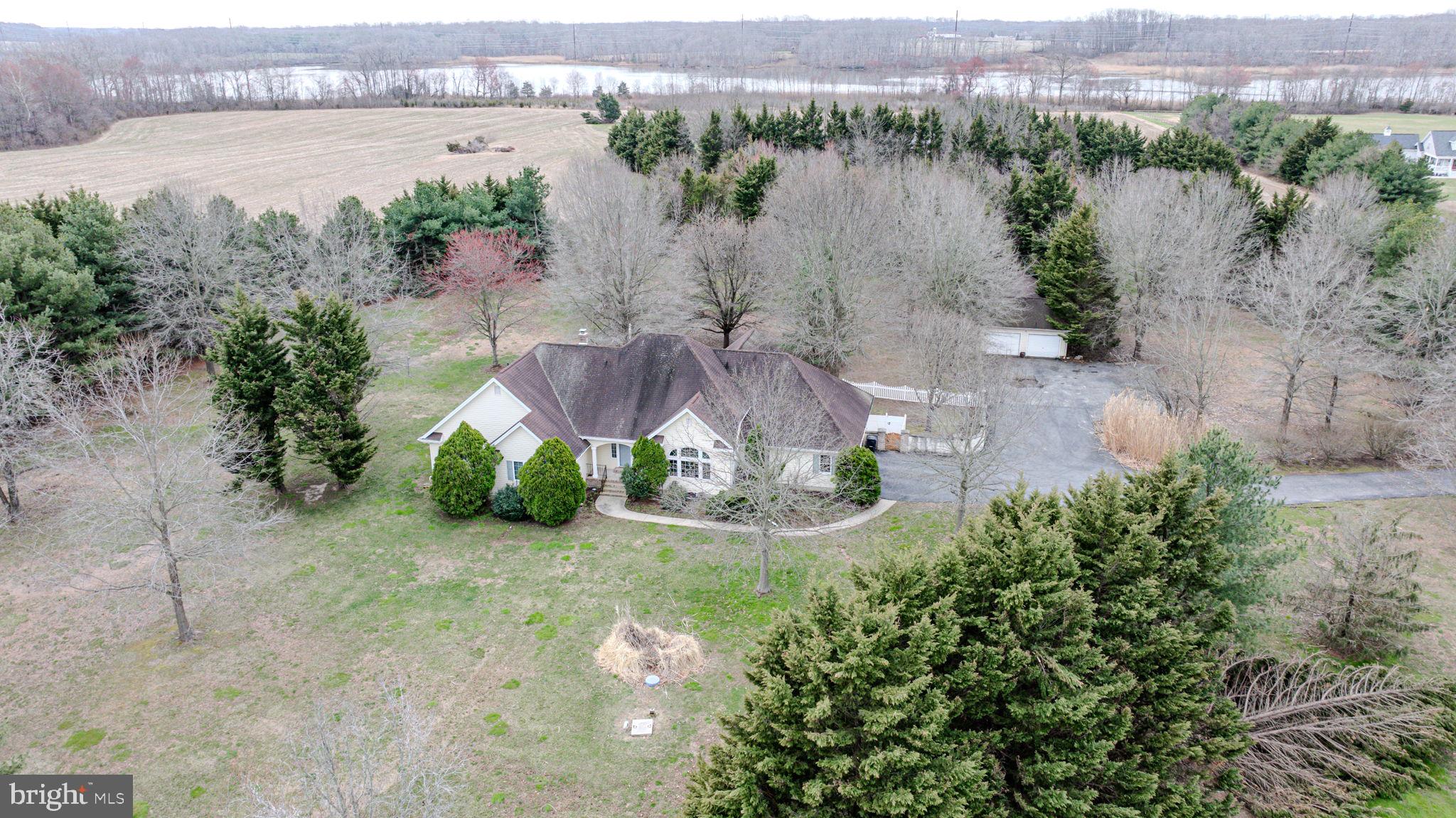 812 Taylors Bridge Road Townsend, DE 19734 - Photo 40 of 45 an aerial view of a house with a yard and lake view
