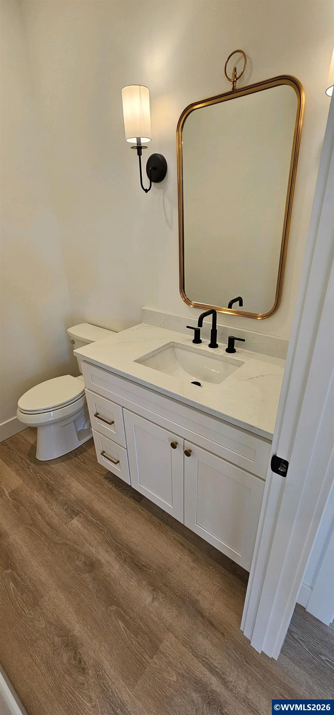 Model B Salishan Street Southeast Salem, OR 97302 - Photo 16 of 30 a bathroom with a sink and a mirror