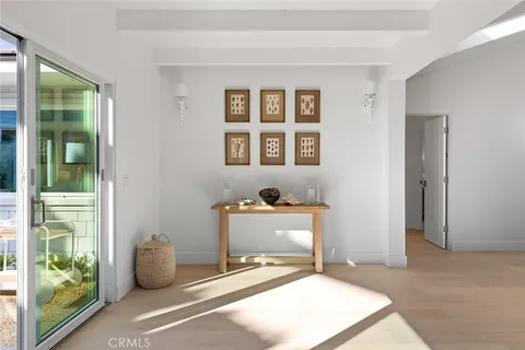 a room with a window and gym equipment