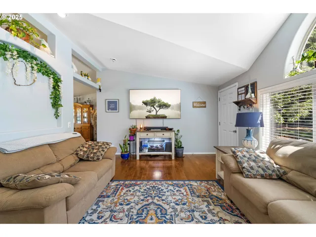 a living room with furniture and a couch