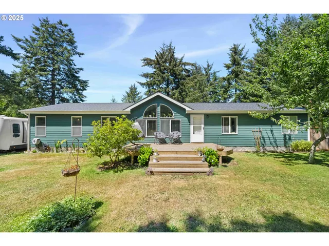 a house with garden in front of it