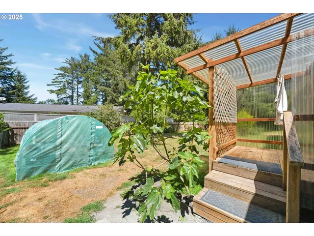 a view of swimming pool with a garden