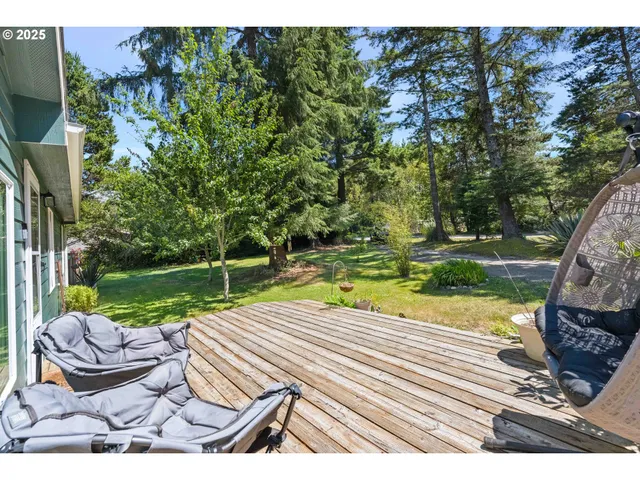 a view of swimming pool with lounge chair