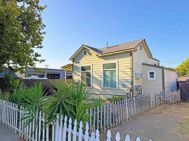 a front view of a house with balcony