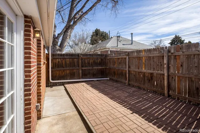 a view of a pathway with a glass door