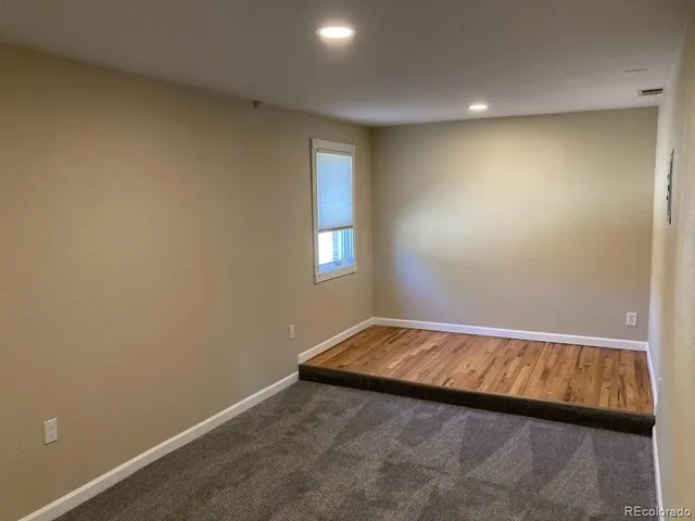 an empty room with window