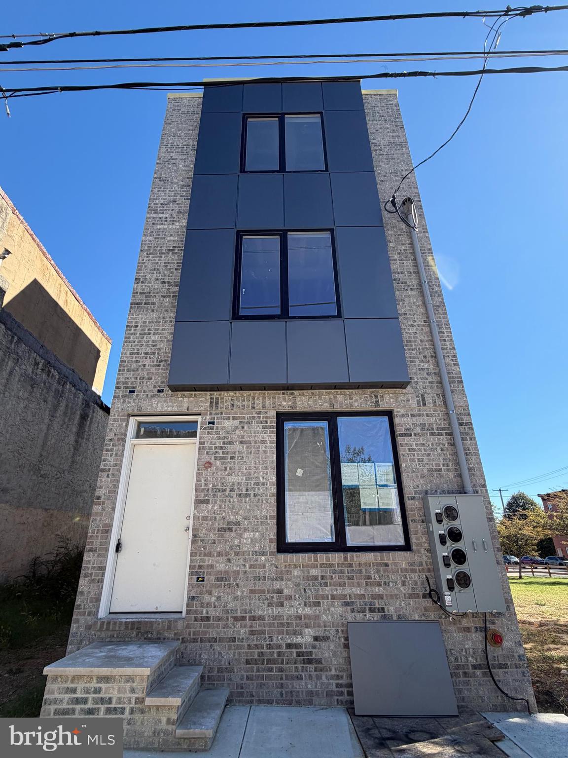 2207 North 4th Street, Unit 2 Philadelphia, PA 19133 - Photo 1 of 1 a building view with a black gate