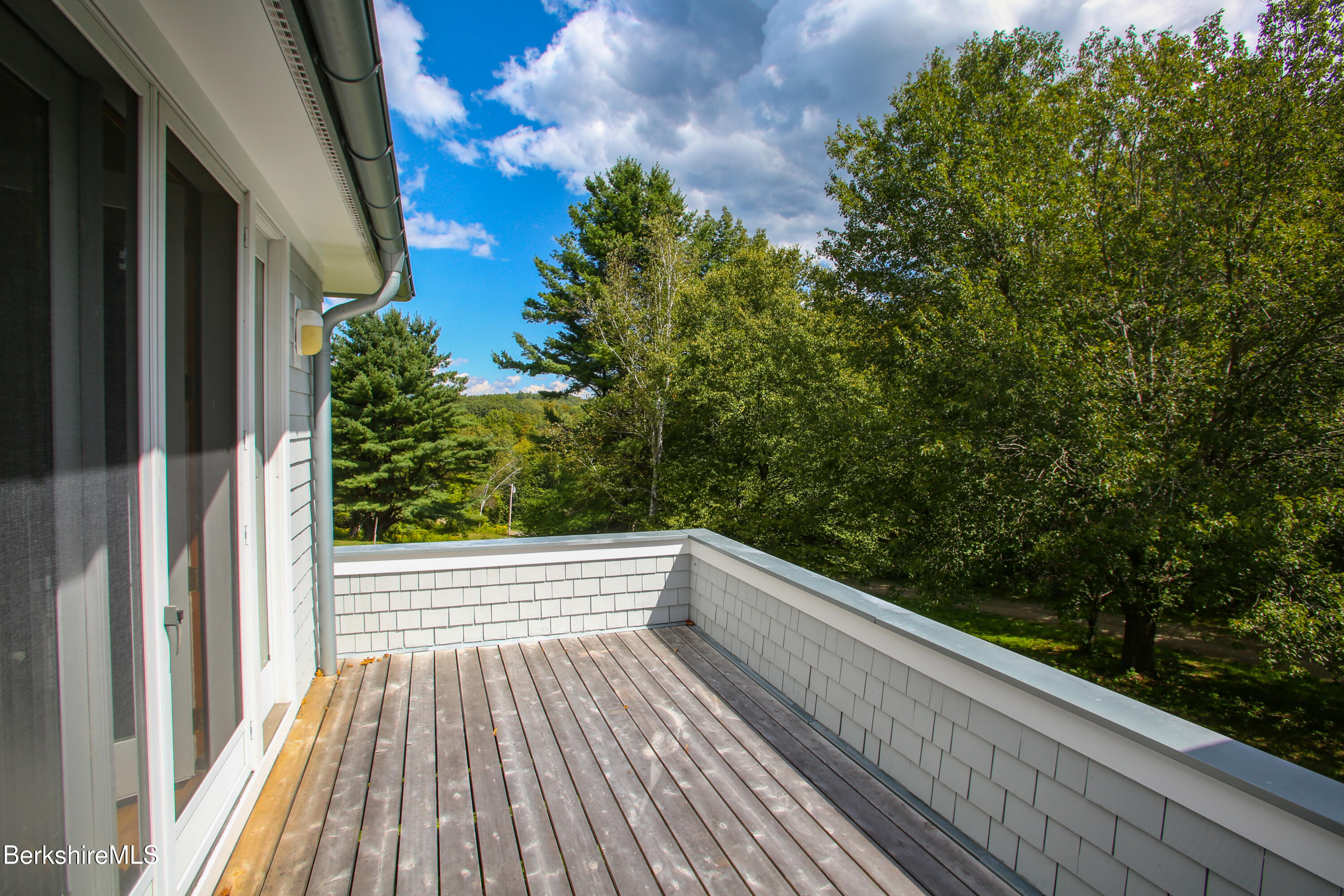 240 Beldingville Road Ashfield, MA 01330 - Photo 14 of 45 a view of balcony with wooden floor and fence