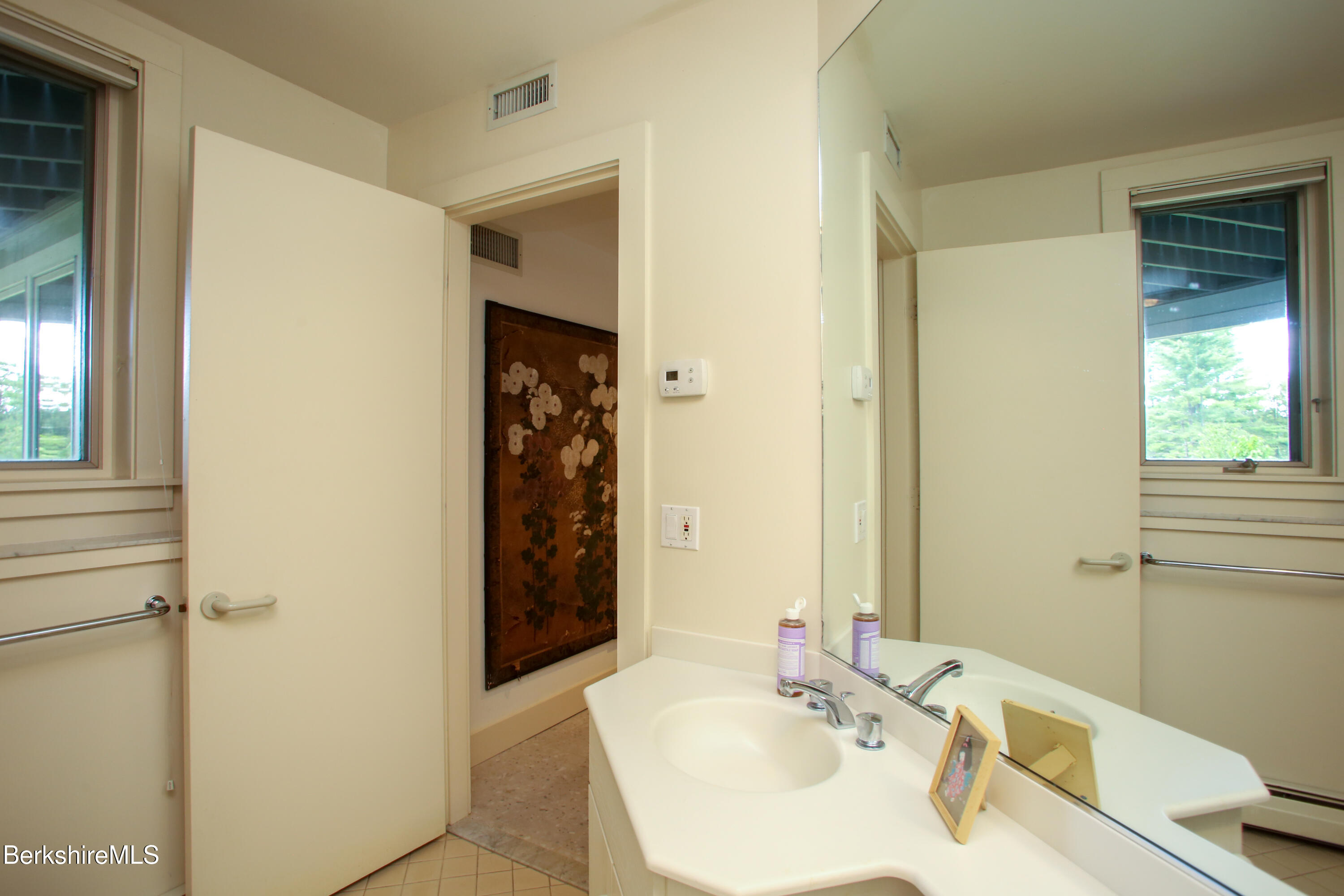 240 Beldingville Road Ashfield, MA 01330 - Photo 31 of 45 a bathroom with a sink and a mirror