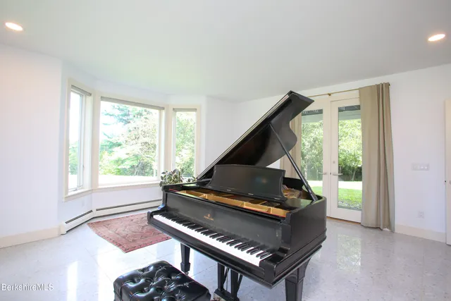 a view of a forest with a street