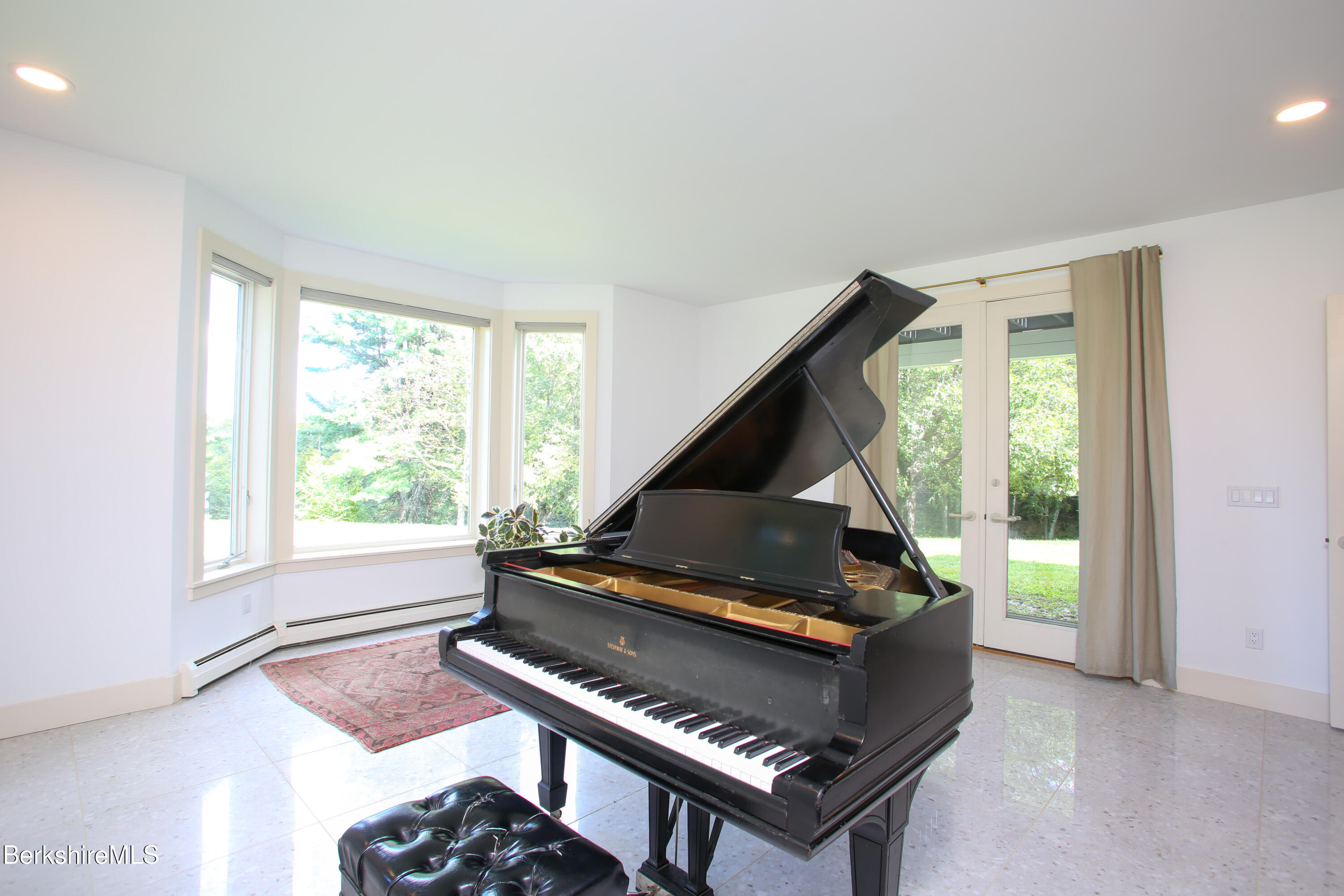 240 Beldingville Road Ashfield, MA 01330 - Photo 35 of 45 a couch sitting in a room next to a window