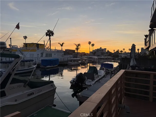 a bed room with a bed and a chair