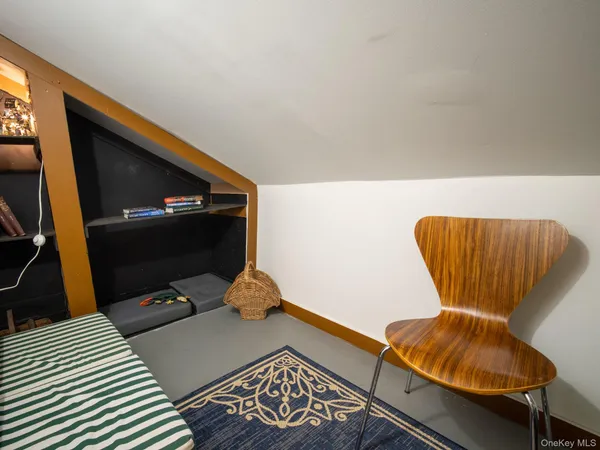 a living room with a couch and a flat screen tv