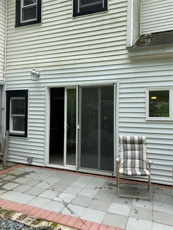 a view of a house with a door and a outdoor space