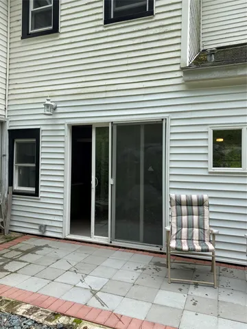 a view of a house with a door and a outdoor space
