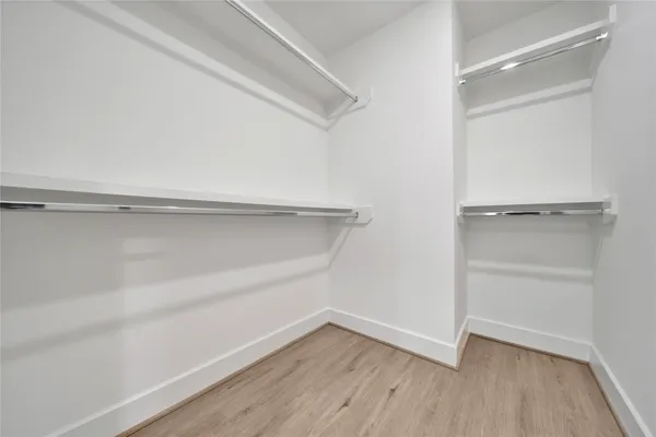 a view of an empty walk in closet